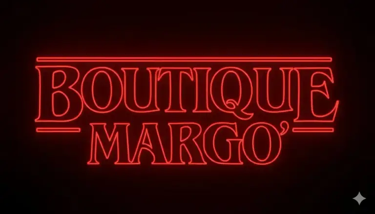 Look femminile ispirato alla moda anni 80 con spalle strutturate e power dressing